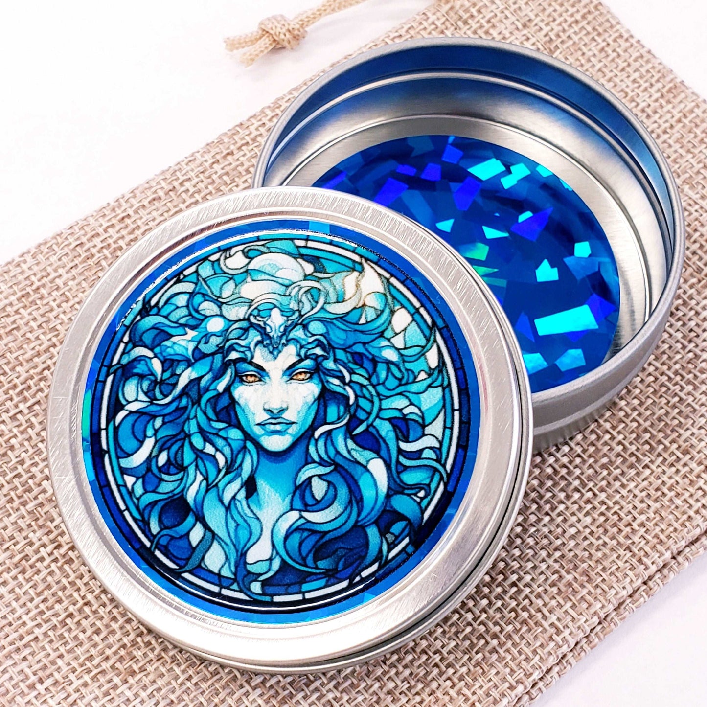 Medusa Gift Container. Small round metal tin with Medusa the mythological Greek goddess in blue graphics. Stocking Stuffer gift for her.