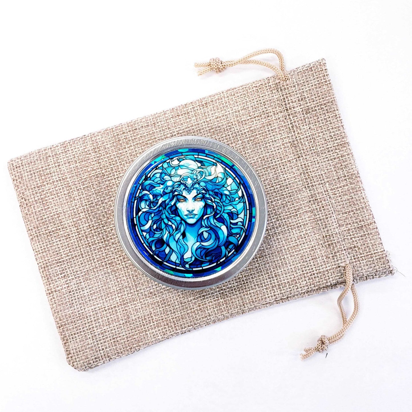 Medusa Gift Container. Small round metal tin with Medusa the mythological Greek goddess in blue graphics. Stocking Stuffer gift for her.
