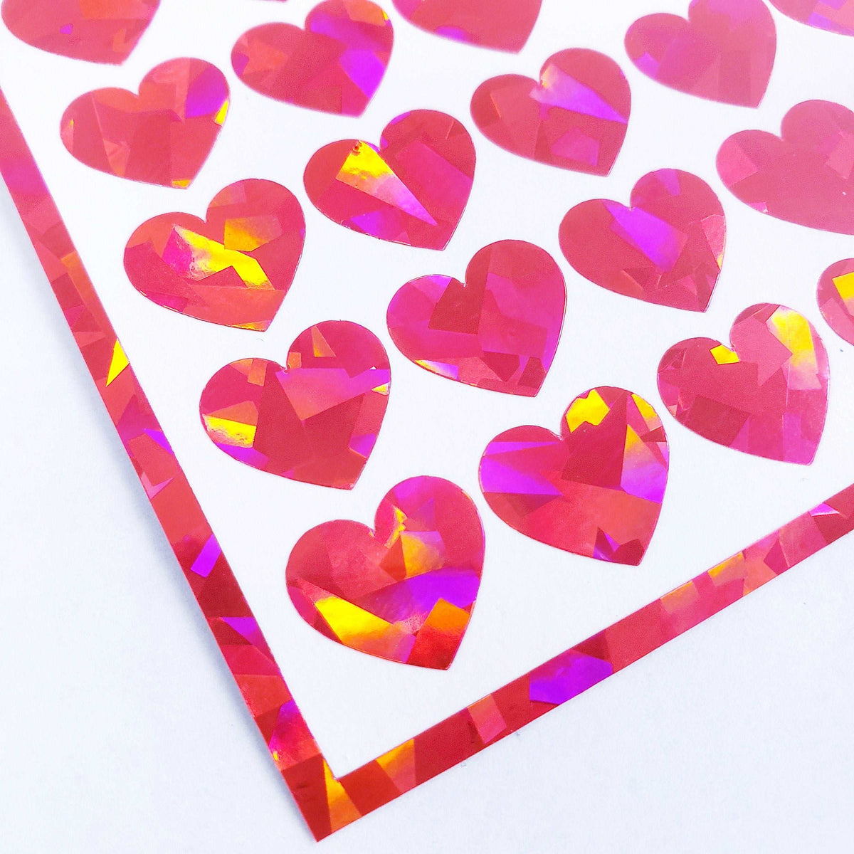 Bubblegum Pink Hearts Sticker Sheet. Set of 104 sparkly vinyl decals for planners, notebooks, journals, and crafts. Pink half inch hearts.