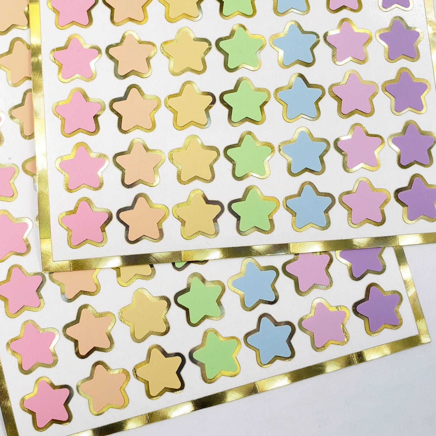 Pastel Rainbow Star Stickers, set of 70 small soft colored kawaii stars for cards, journals, envelopes, invitations, laptops and crafts.