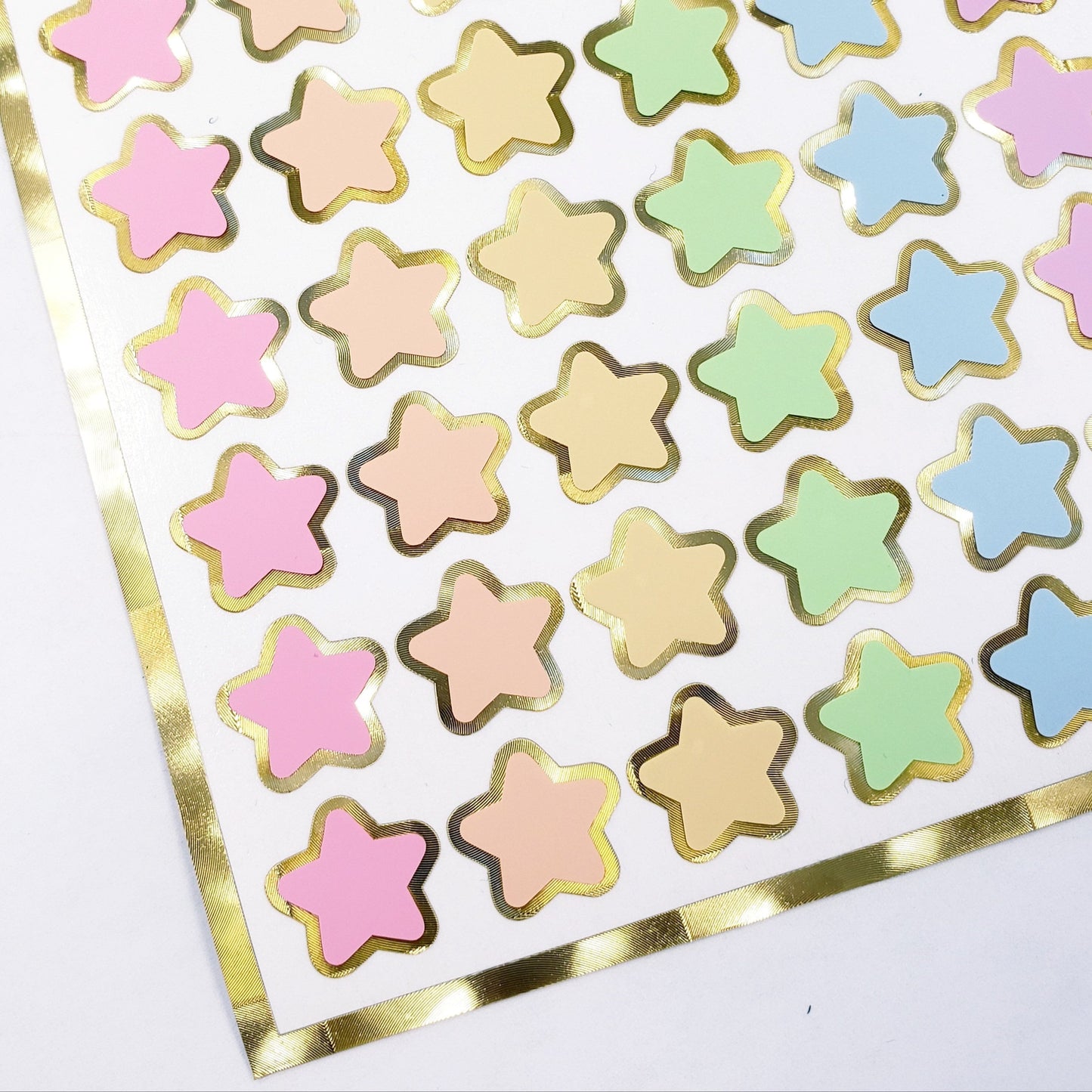 Pastel Rainbow Star Stickers, set of 70 small soft color kawaii stars for cards, envelopes, invitations, laptops and crafts. Silver outline