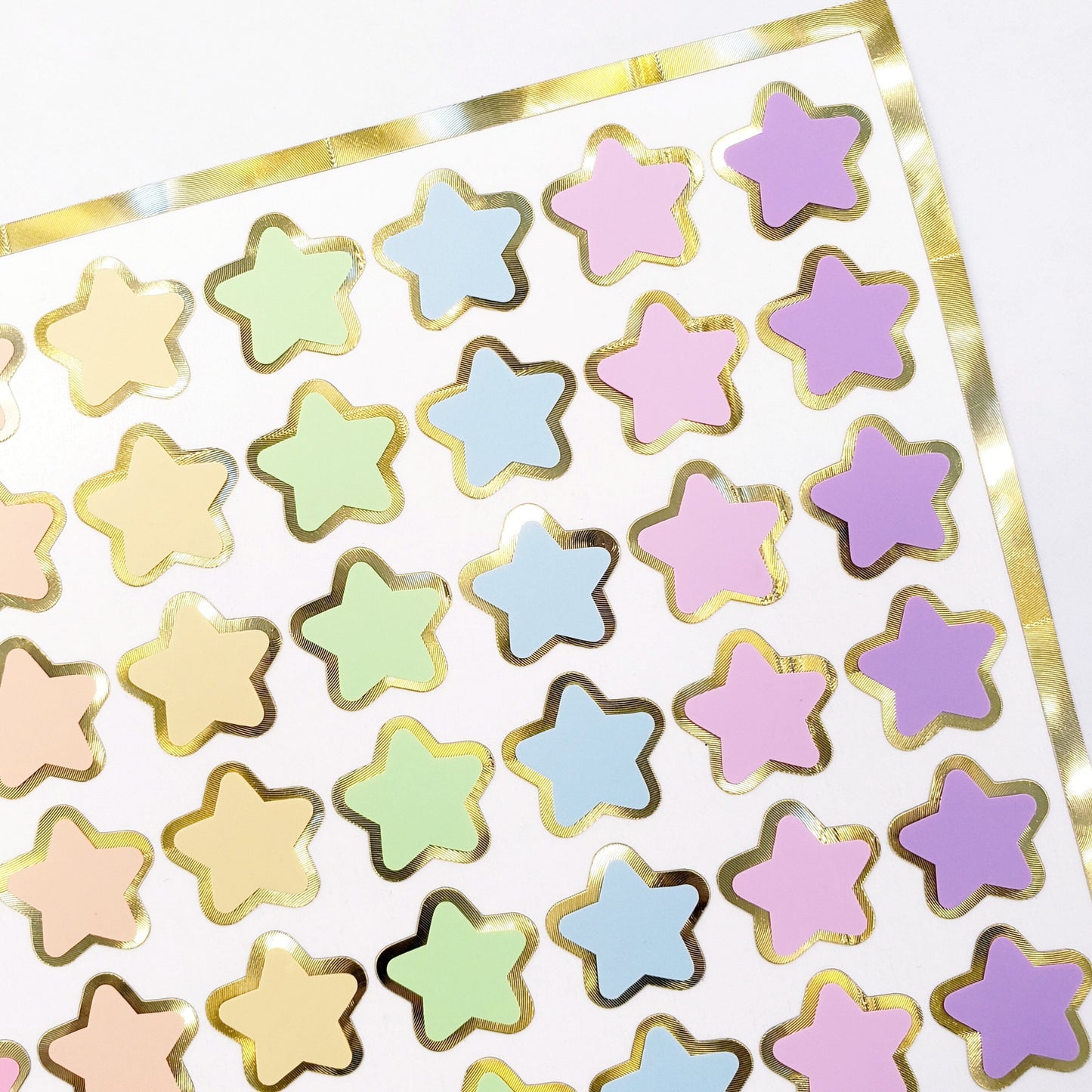 Pastel Rainbow Star Stickers, set of 70 small soft color kawaii stars for cards, envelopes, invitations, laptops and crafts. Silver outline