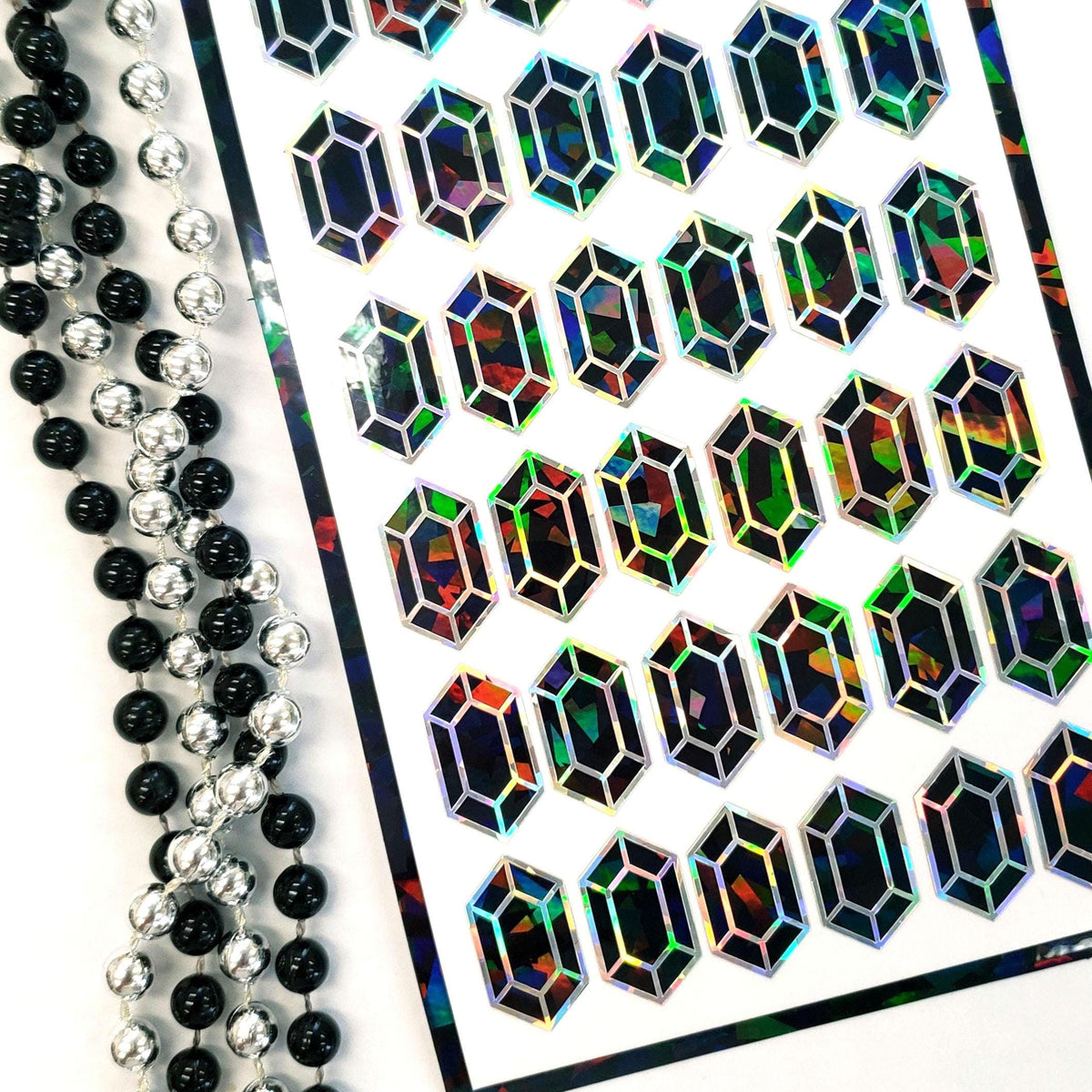 Black Rupee Gem Sticker Set of 36 sparkly black vinyl stickers for gamers, journals, notecards, laptops and crafts.