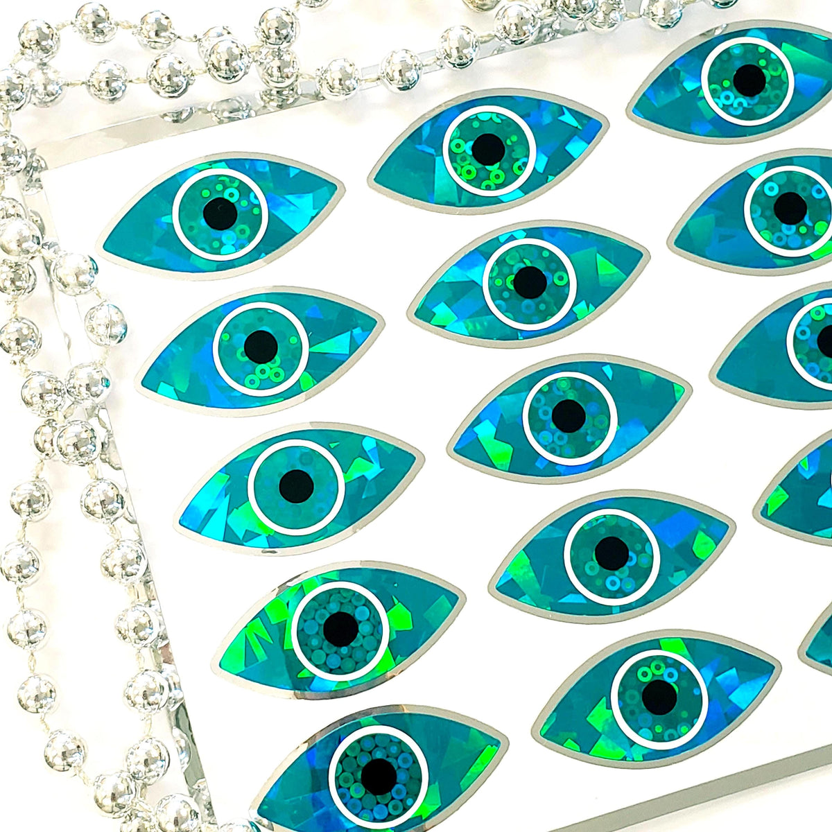 set of 20 individual turquoise eye shaped stickers