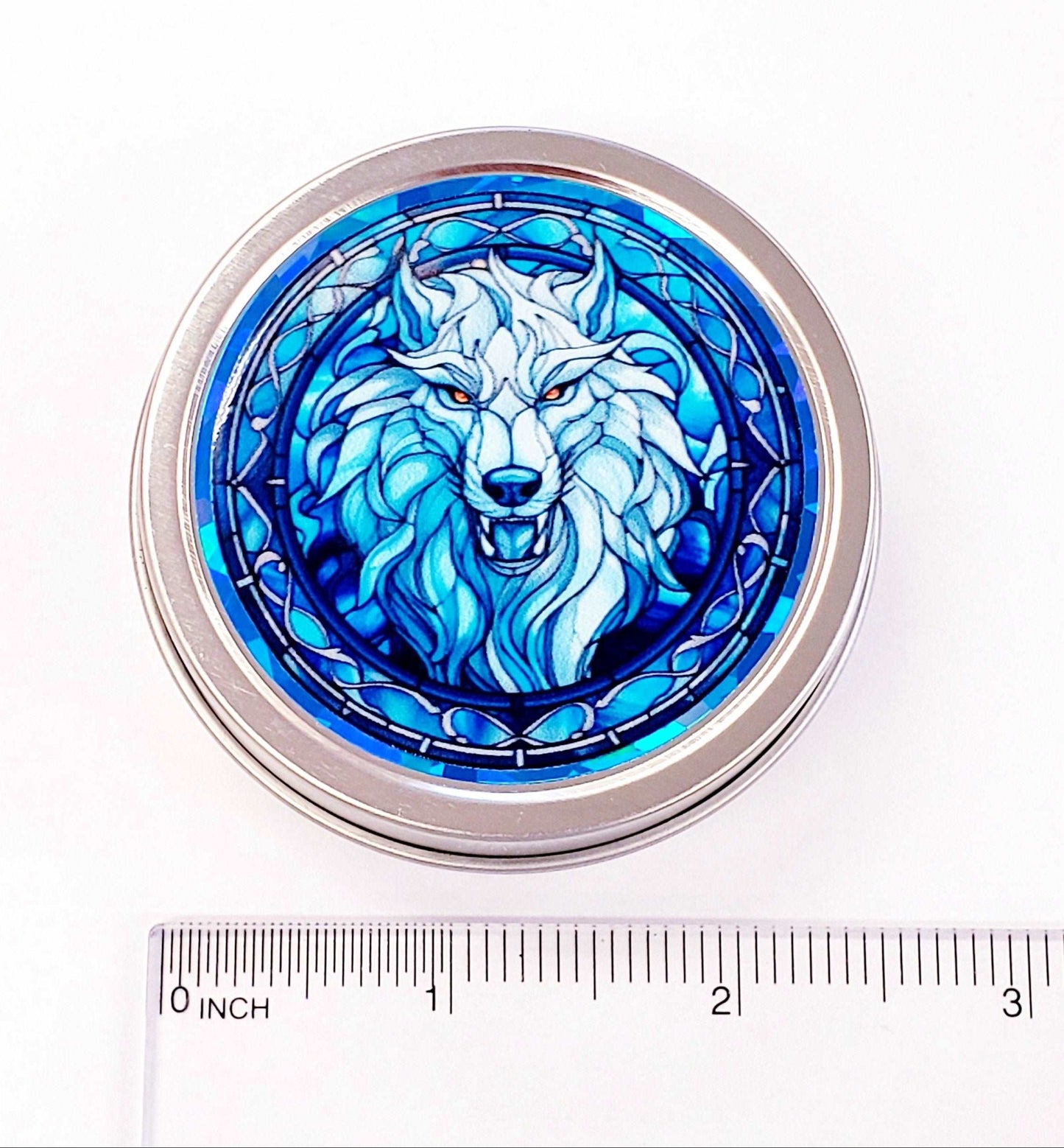 Wolf Container. Small round metal tin with blue wolf monster graphics. Mystical Creature gift for wolf collector. Stocking Stuffer.