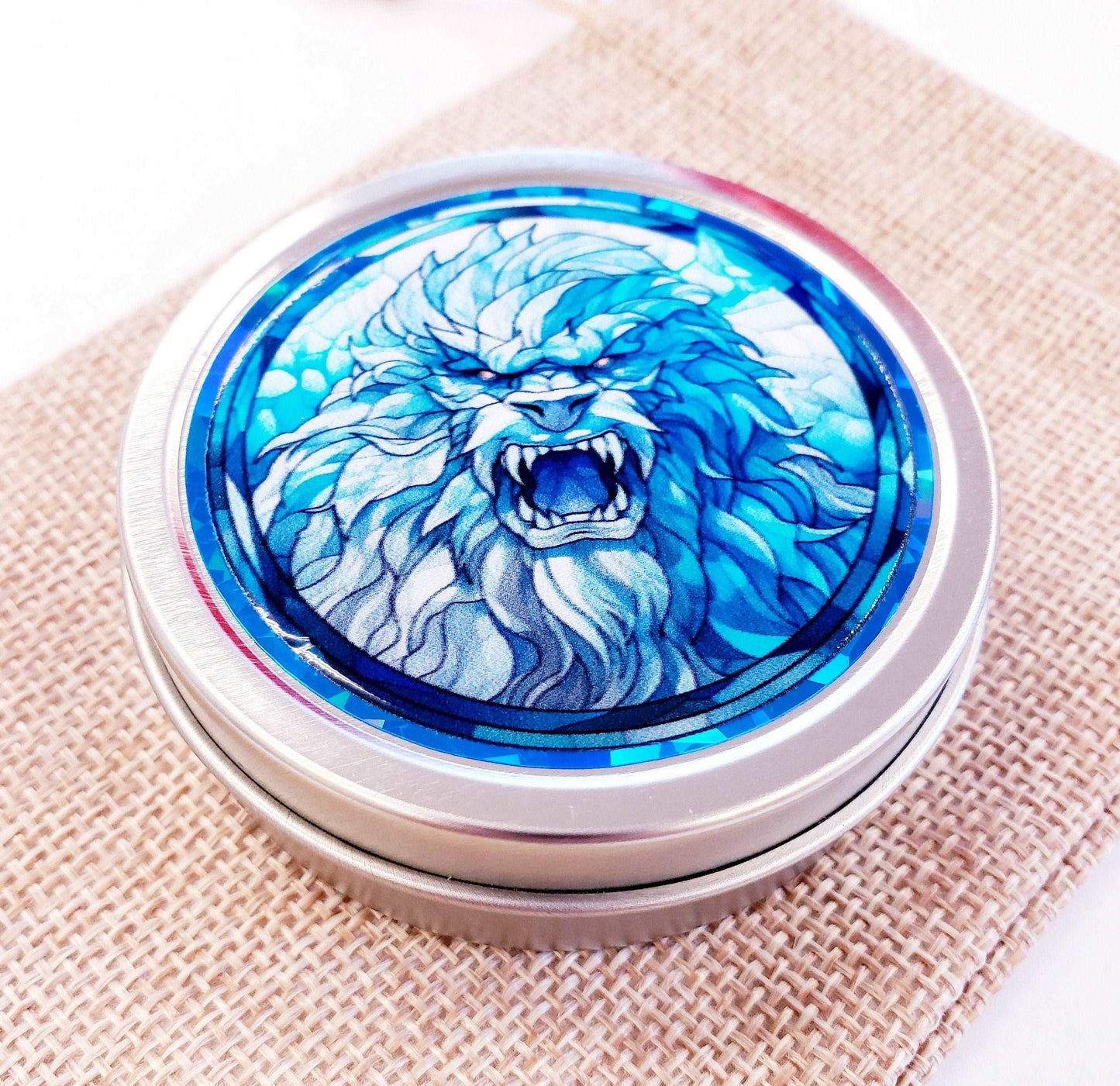 Abominable Snowman Gift. Small round metal container with blue yeti snow monster graphics. Mystical Creature gift for him. Stocking Stuffer.