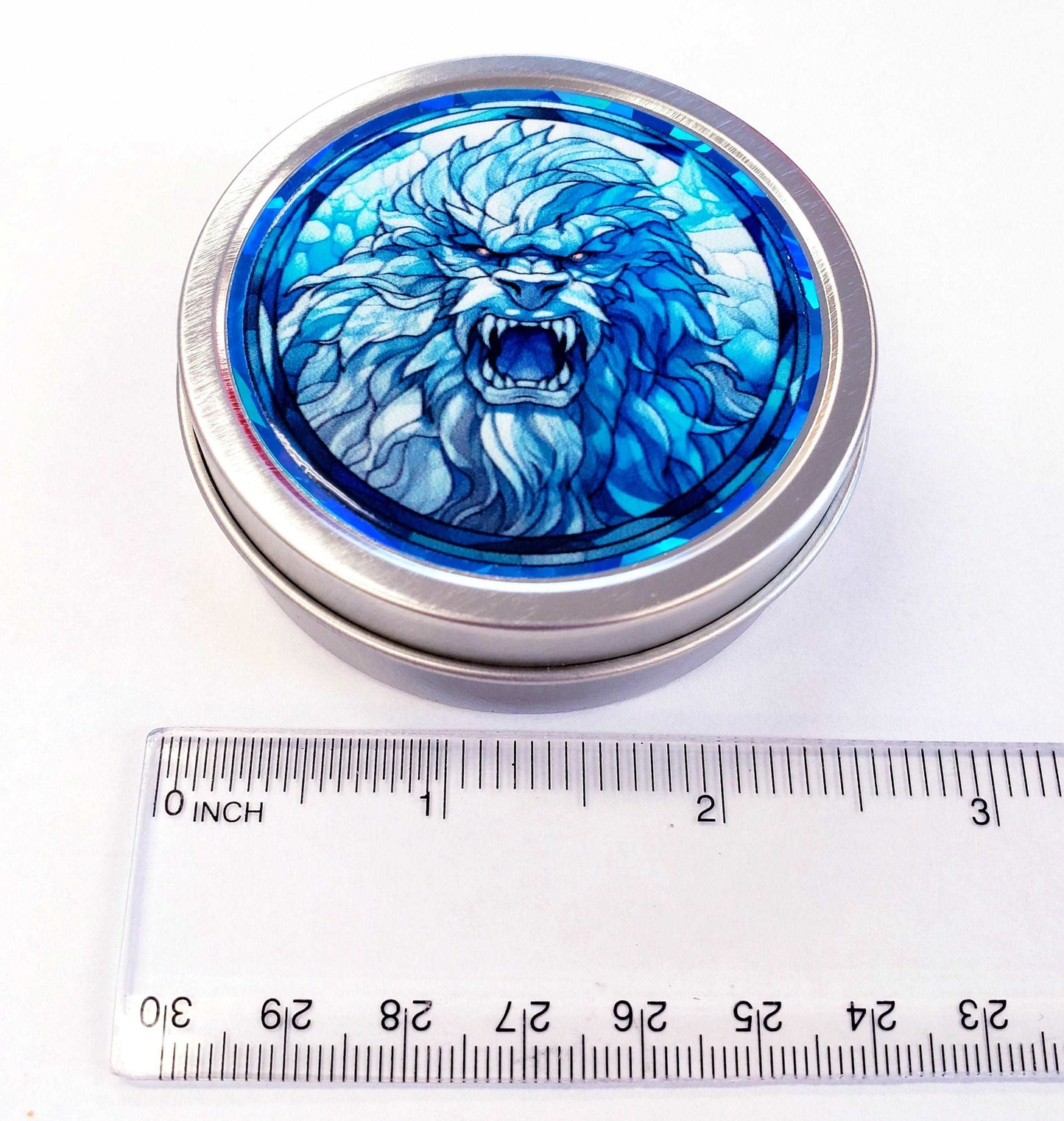 Abominable Snowman Gift. Small round metal container with blue yeti snow monster graphics. Mystical Creature gift for him. Stocking Stuffer.