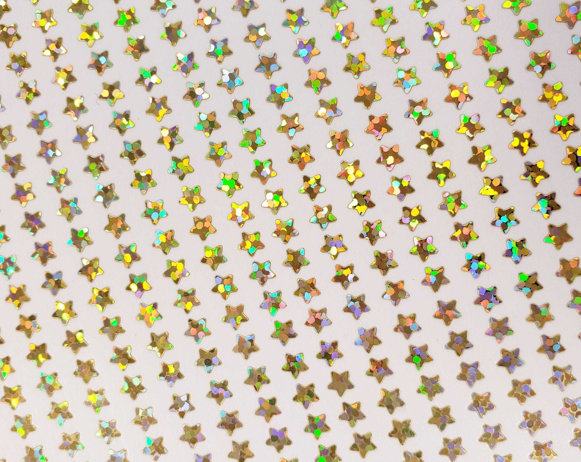 Extra Small Gold Star Stickers, set of 600 micro sized golden star vinyl stickers for journals, notebooks, nail art and craft projects