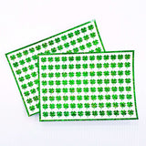Green Clovers Sticker Sheet. Set of 104 four leaf clover glitter vinyl decals for teachers, journals and crafts. St. Patrick's Day Stickers.