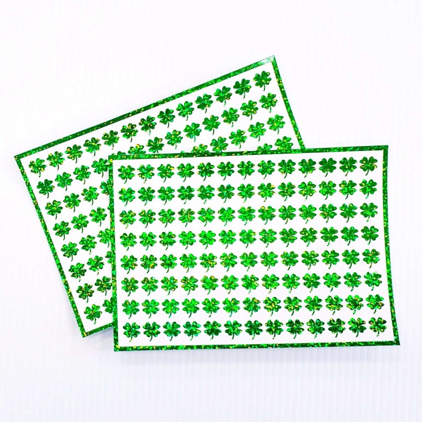 Green Clovers Sticker Sheet. Set of 104 four leaf clover glitter vinyl decals for teachers, journals and crafts. St. Patrick's Day Stickers.