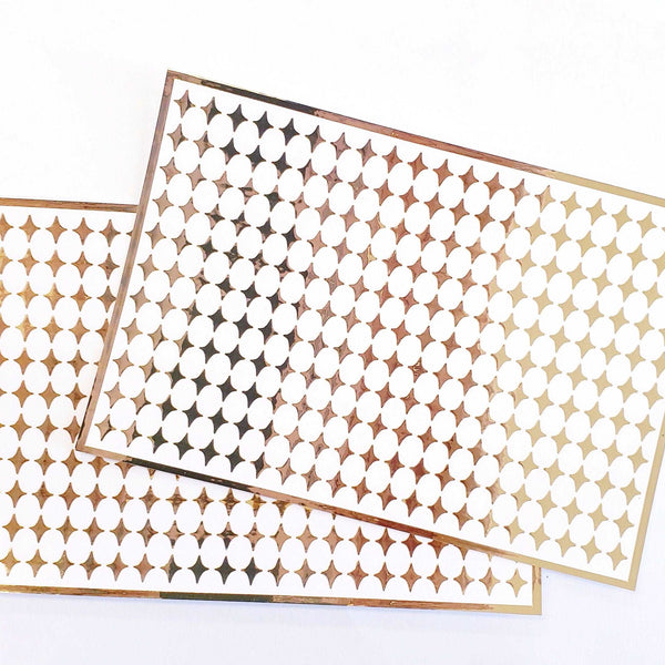 Small Gold Four-Pointed Stars Sticker Sheet. Set of 231 mirror gold peel and stick vinyl star decals for nails, planners and ornaments.