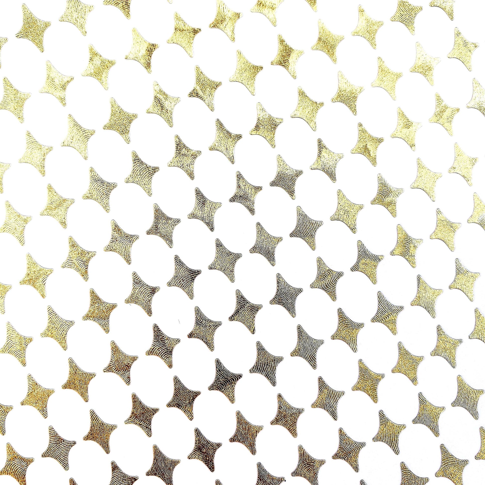 Small Gold Four-Pointed Stars Sticker Sheet. Set of 231 metallic gold peel and stick vinyl star decals for nails, planners and ornaments.