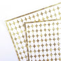 Small Gold Four-Pointed Stars Sticker Sheet. Set of 231 metallic gold peel and stick vinyl star decals for nails, planners and ornaments.