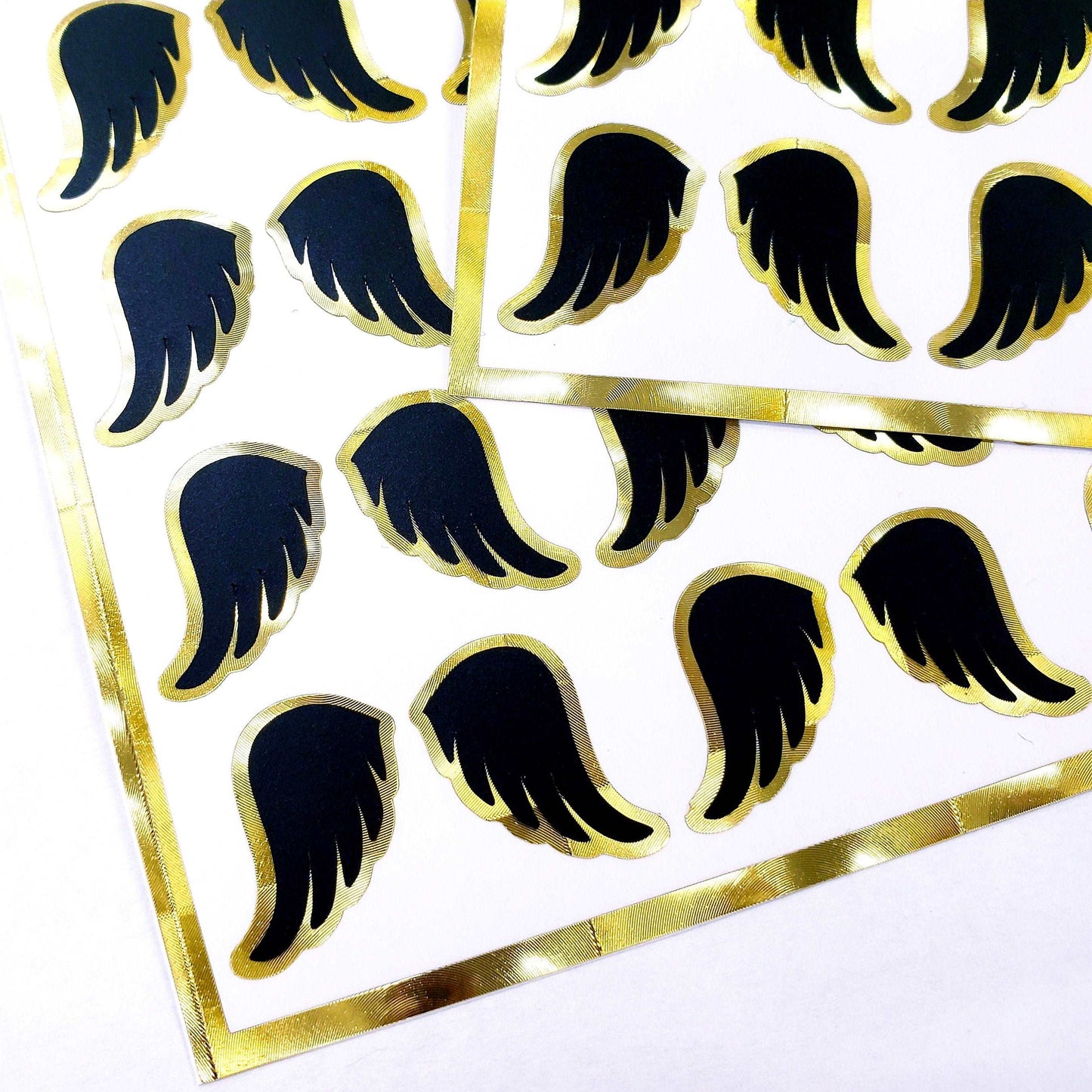 Black Angel Wing Stickers, set of 42 black and gold wing stickers for invitations, envelopes, memorial cards, planners, journals and crafts.