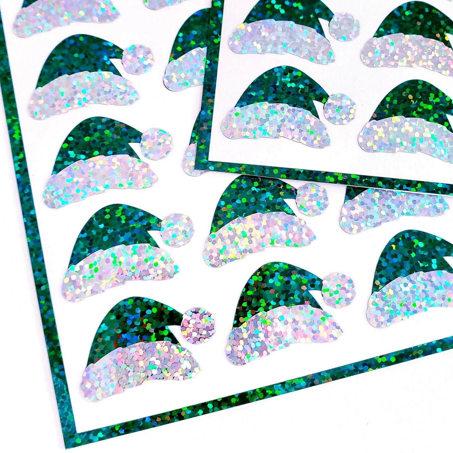 Elf Hats Stickers. Set of 25 Santa's Helper Hat, decorative green glitter vinyl stickers for advent calendars, holiday cards and envelopes.