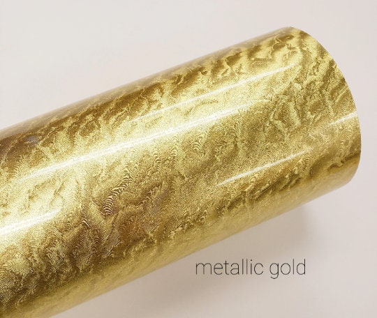 A roll of metallic gold vinyl