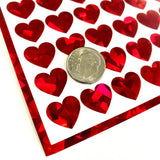 Red Hearts Sticker Sheet. Set of 104 sparkly vinyl heart decals for planners, notebooks, journals, charts and crafts. Red half inch hearts.