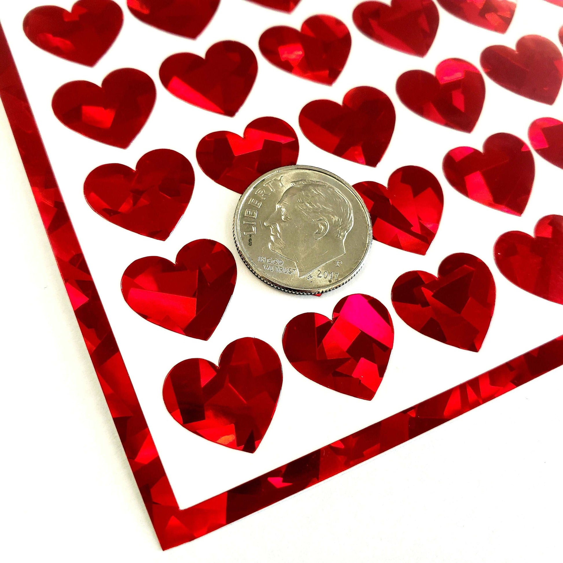 Red Hearts Sticker Sheet. Set of 104 sparkly vinyl heart decals for planners, notebooks, journals, charts and crafts. Red half inch hearts.