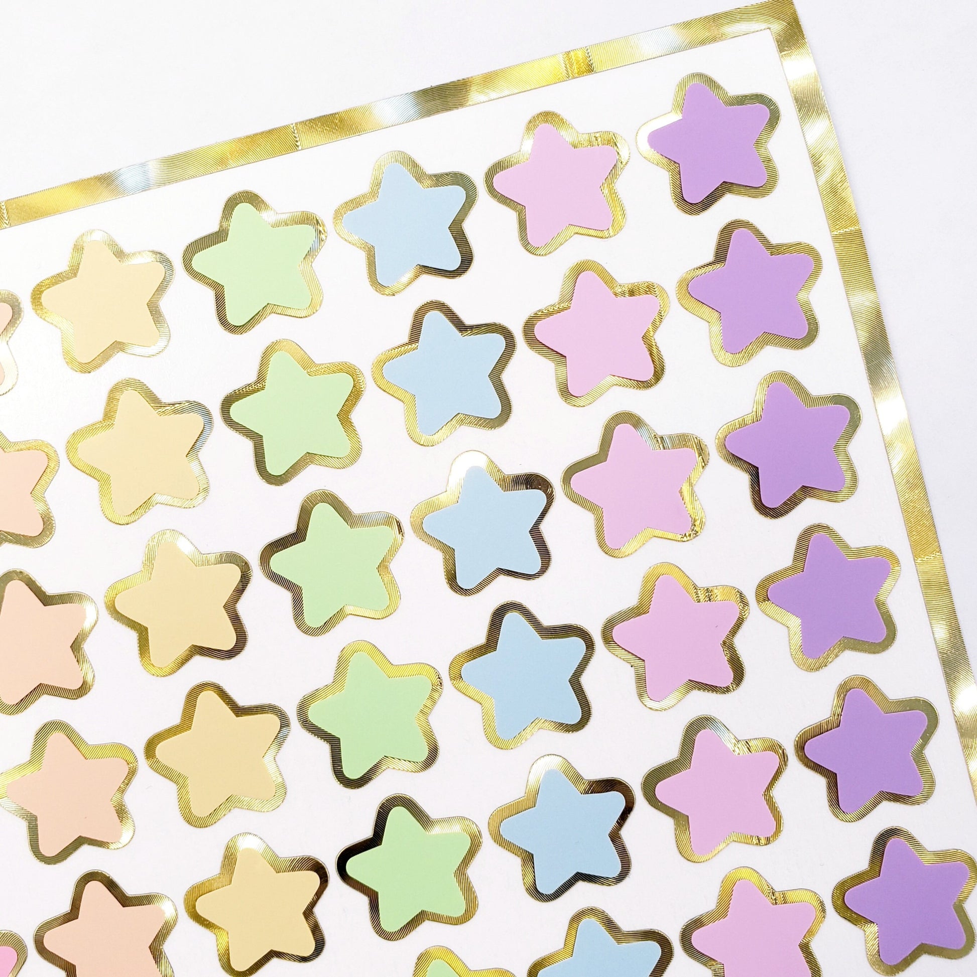 Pastel Rainbow Star Stickers, set of 70 small soft color kawaii stars for cards, envelopes, invitations, laptops and crafts. Silver outline