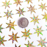 Gold Seven Point Starburst Stickers, set of 48 sparkly star stickers for ornaments, journals, planners, gift tags and craft projects.