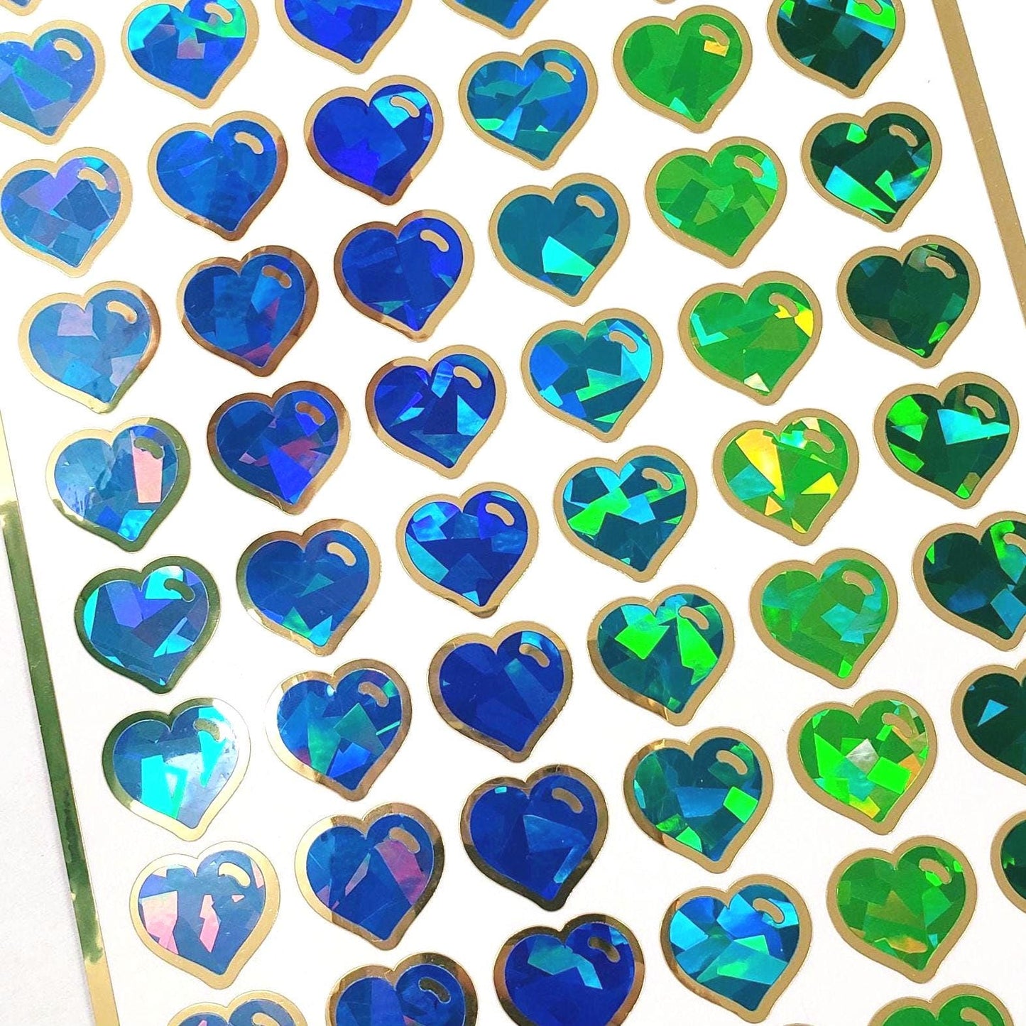 Blue Crystal Heart Stickers for Valentine's Day, set of 60 small heart embellishments for cards, envelopes and scrapbooks. Silver outline.