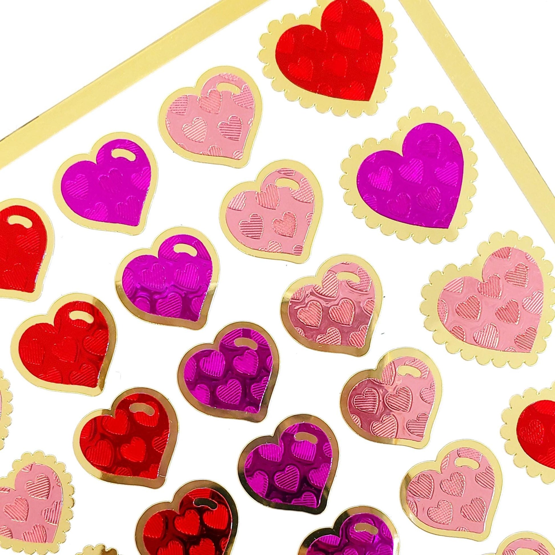 Heart Stickers for Valentine's Day, set of 78 small pink and red heart decals for cards, envelopes, journals, and scrapbook embellishments.