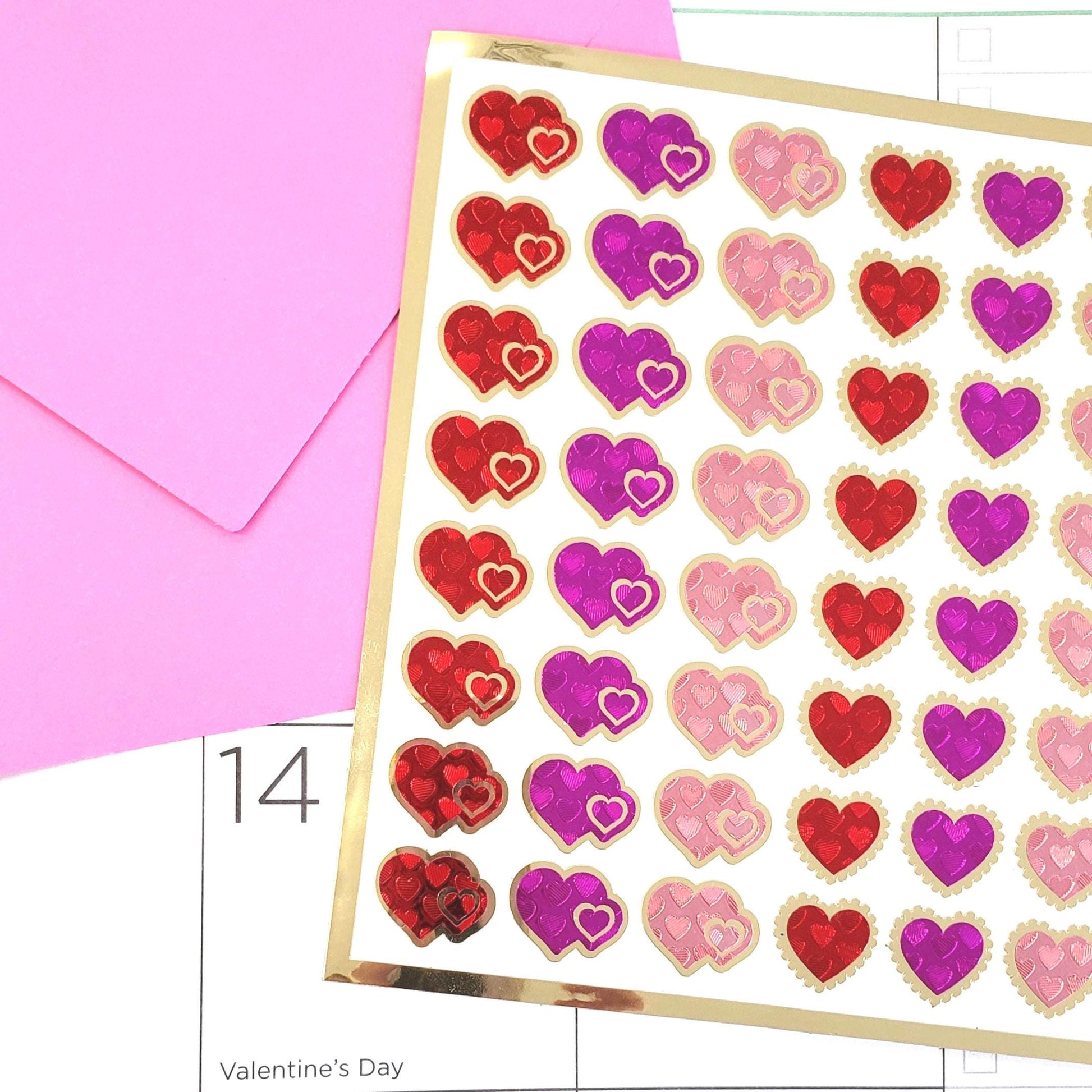 Heart Stickers for Valentine's Day, set of 78 small pink and red heart decals for cards, envelopes, journals, and scrapbook embellishments.