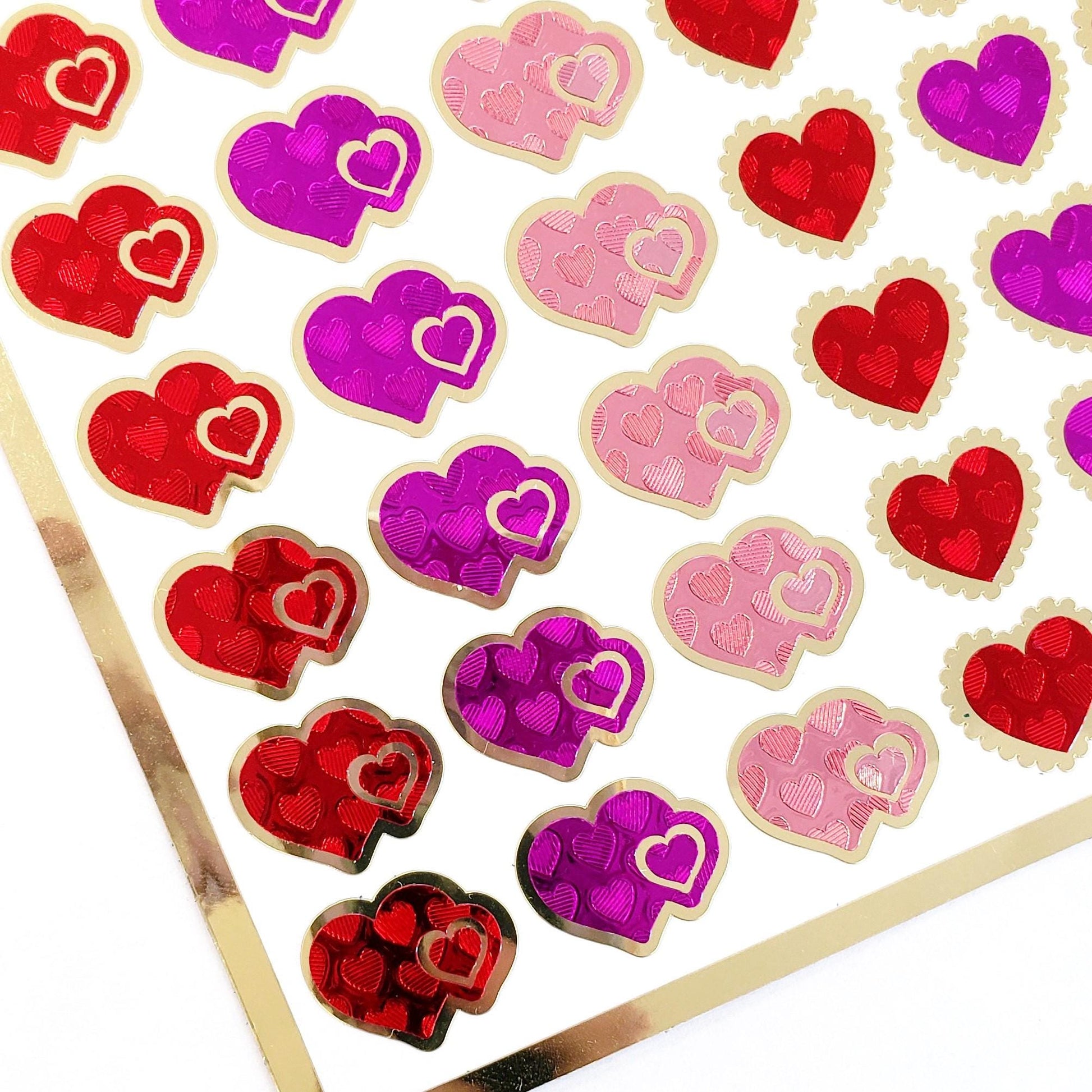 Heart Stickers for Valentine's Day, set of 78 small pink and red heart decals for cards, envelopes, journals, and scrapbook embellishments.