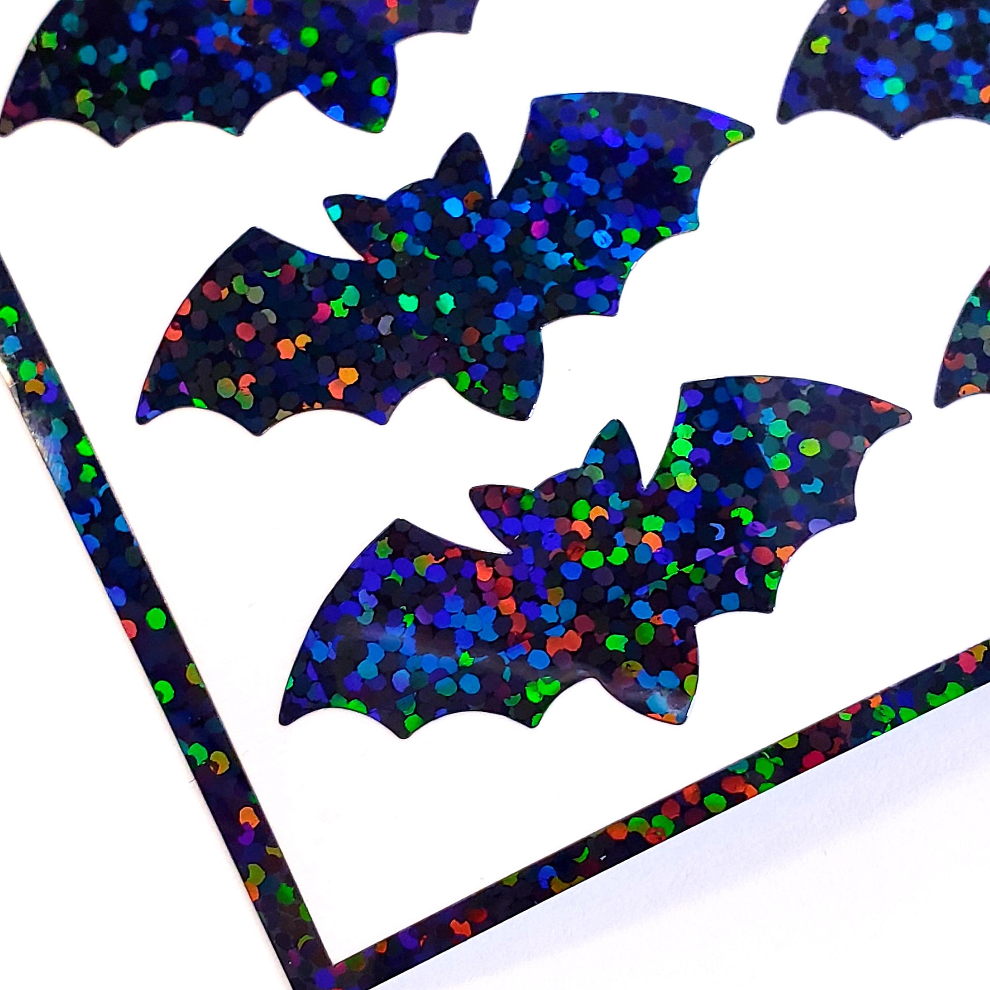 Sparkly black bat stickers for Halloween decor