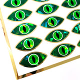 Sparkly green dragon eyes sticker sheet