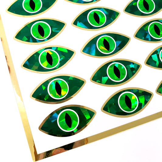 Sparkly green dragon eyes sticker sheet