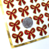 Small Red Ribbon Stickers - set of 48 sparkly coquette bows for holiday cards, gift tags and calendars. Waterproof Christmas bow stickers.