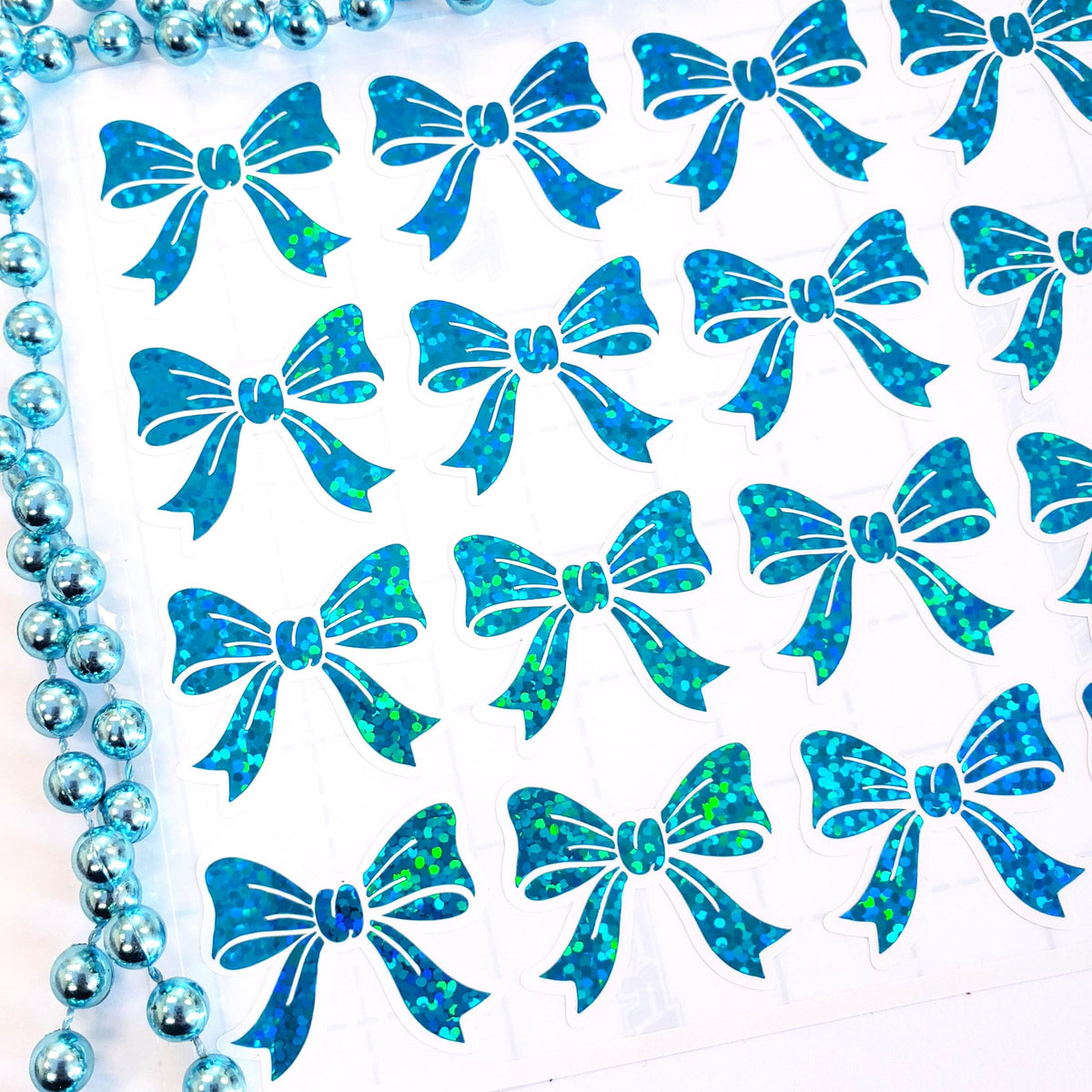 Turquoise glitter bow stickers