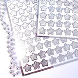 Silver Star Stickers, set of 70 small chrome silver metallic kawaii stars for cards, envelopes, invitations, laptops and crafts.