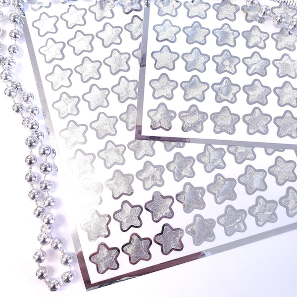 Silver Star Stickers, set of 70 small chrome silver metallic kawaii stars for cards, envelopes, invitations, laptops and crafts.