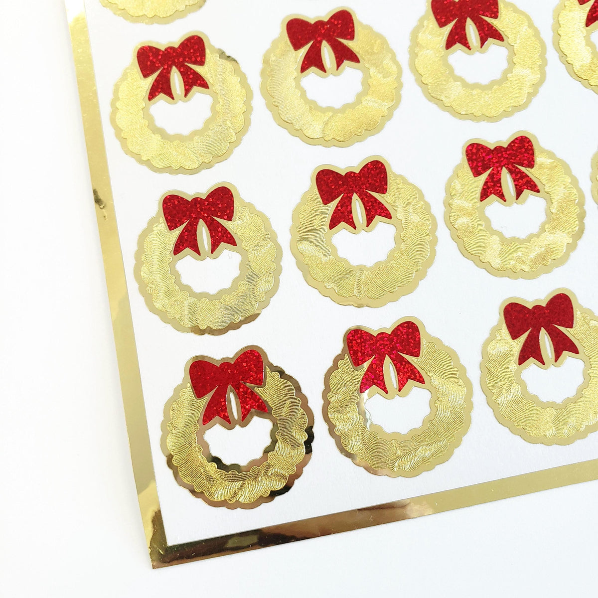 Christmas Wreath Stickers, set of 20 small gold and red decals for holiday envelopes and gift tags.