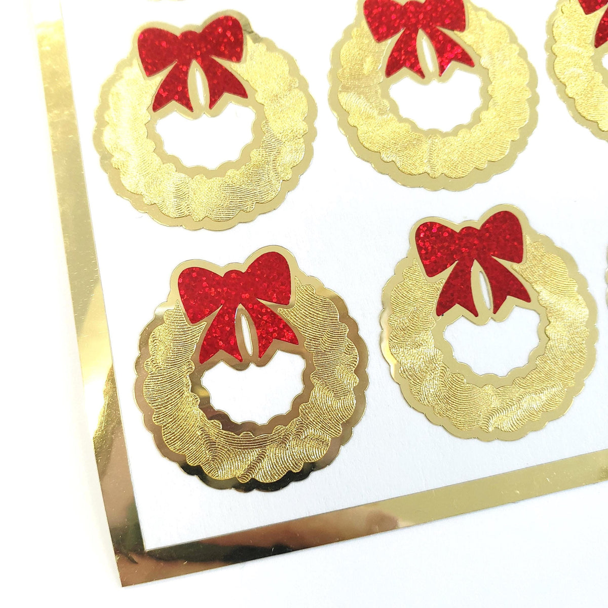 Christmas Wreath Stickers, set of 20 small gold and red decals for holiday envelopes and gift tags.