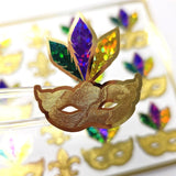Mardi Gras Stickers, set of 12 gold purple and green sparkly mask stickers.