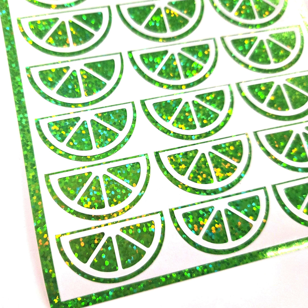 Lime Stickers, sheet of 24 green and white lime wedge vinyl decals.