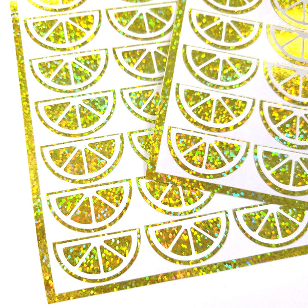 Lemon Stickers, sheet of 24 yellow and white lemon slice vinyl decals.