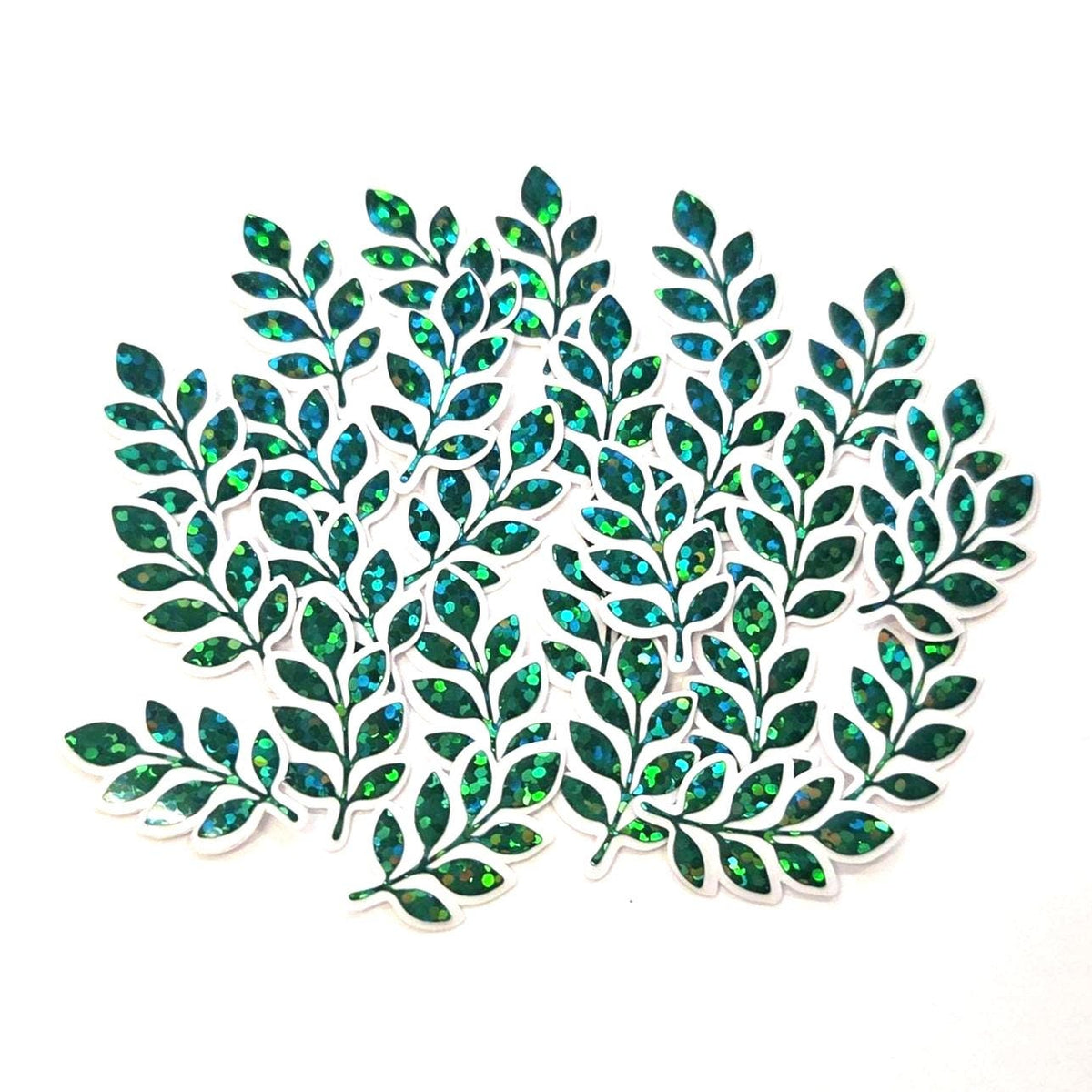 A collection of green leaf-shaped embellishments with glitter accents. Each leaf has a clear outline.