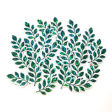 A collection of green leaf-shaped embellishments with glitter accents. Each leaf has a clear outline.