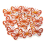 mini die cut butterfly shaped stickers in orange glitter