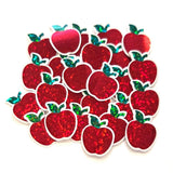 mini red apple glitter stickers with green leaf and clear outline.
