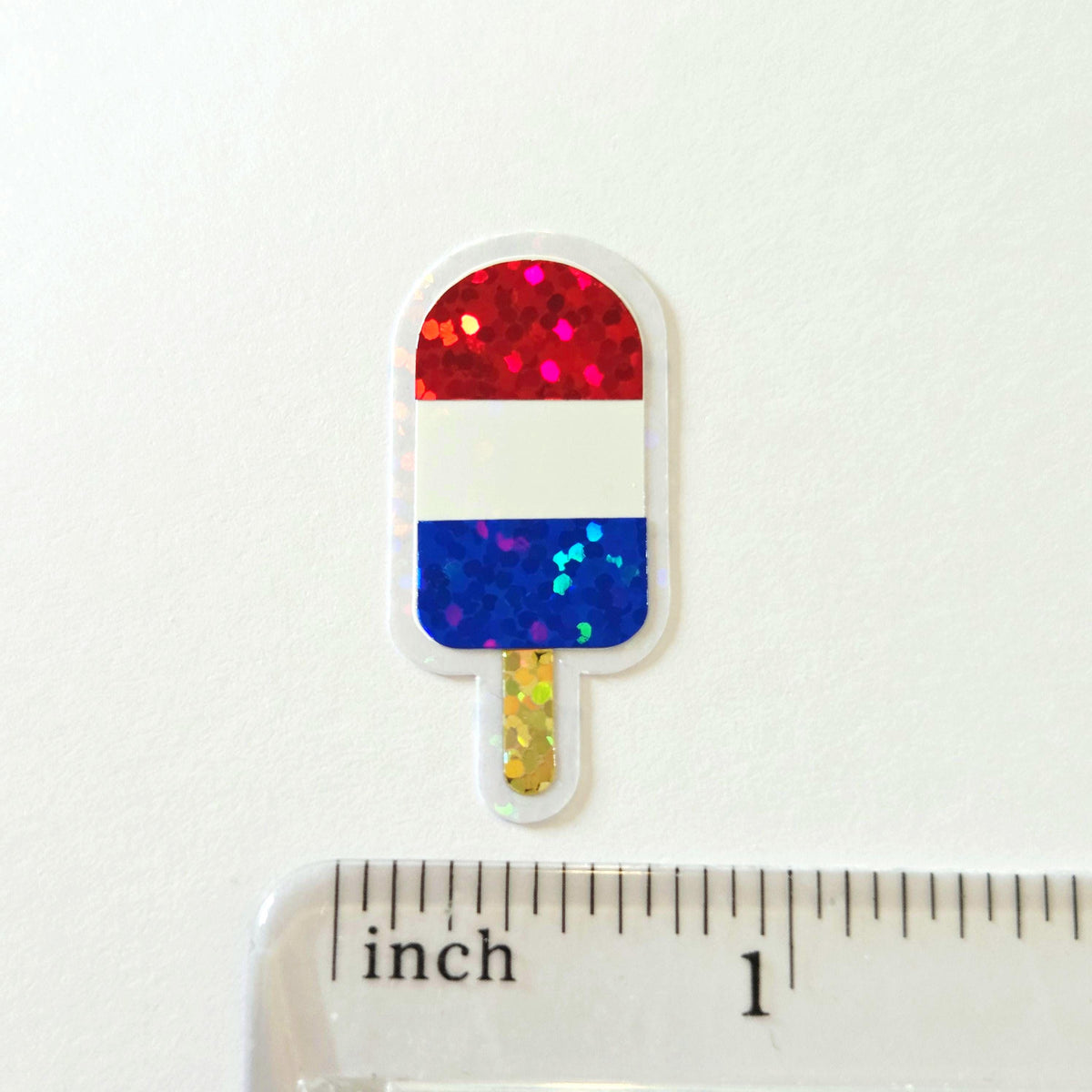Mini American Flag Popsicle Die Cut Stickers, set of 12 in sparkly red, white and blue colors for Independence Day crafts.