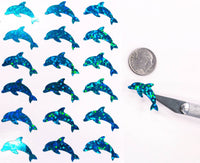 
              Dolphin Stickers. Set of small sparkly turquoise blue dolphin vinyl decals
            