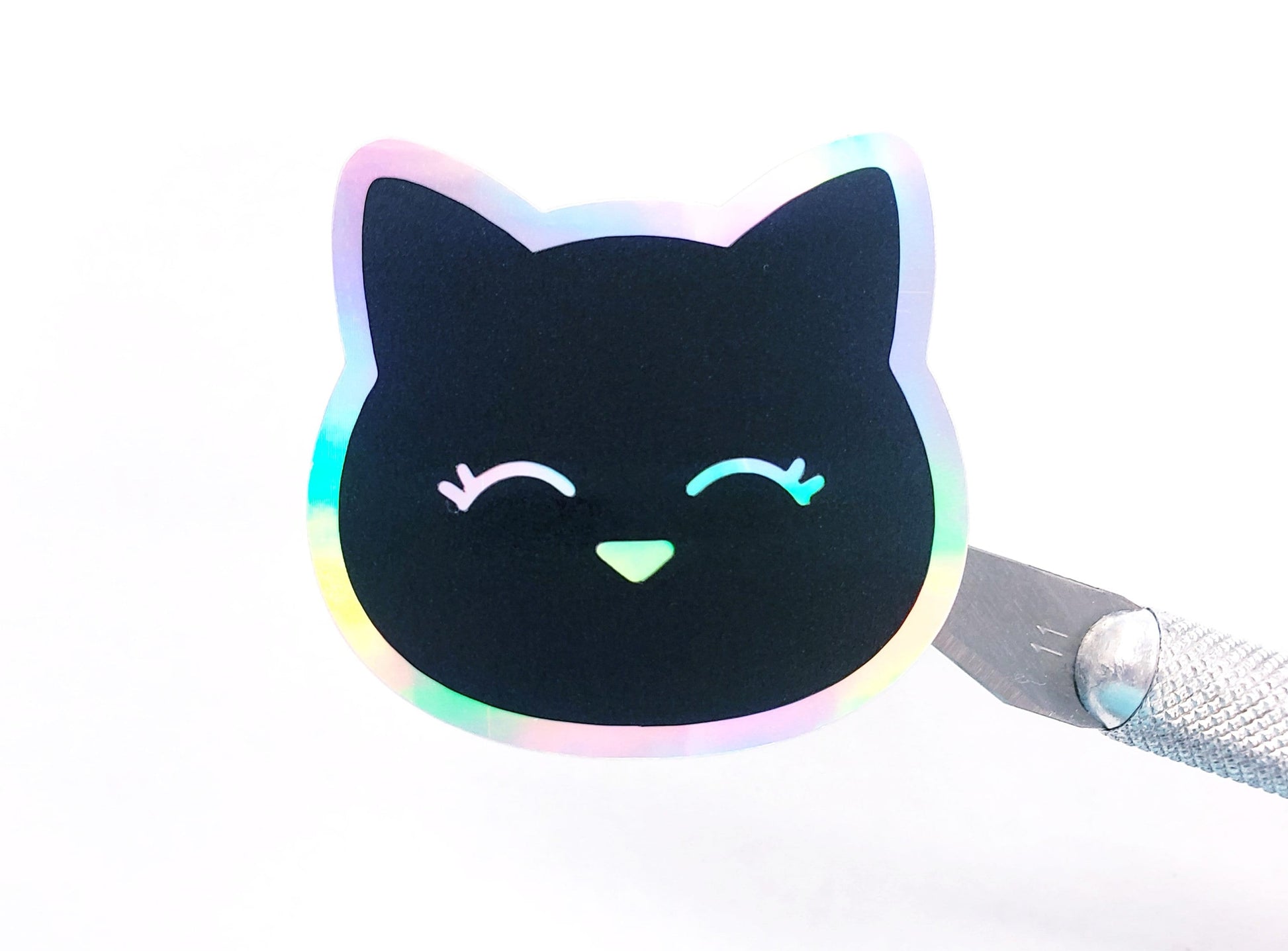 Black Scaredy Cat Holographic Sticker for water bottle, laptop or journal cover.