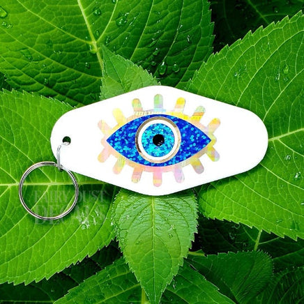 blue evil eye keychain in white