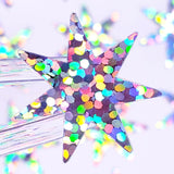 Seven Pointed Starburst Sticker Sheet, set of 48 sparkly star stickers for ornaments, journals, planners, gift tags and craft projects.